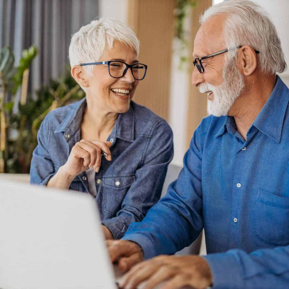 Indiana Precious Metals IRA & Investing Company Copy of Senior couple at laptop smiling GettyImages 1323096524 1200x1200 1